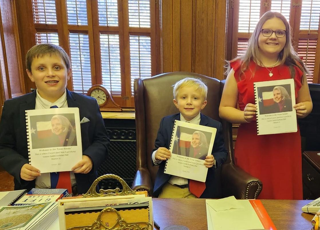 Photo: SENATOR JUDITH ZAFFIRINI’S YOUNG CONSTITUENTS with their copies of her state and national award-winning handbook, 'Welcome to the Texas Senate: This is where I work (and how I got here)'.
