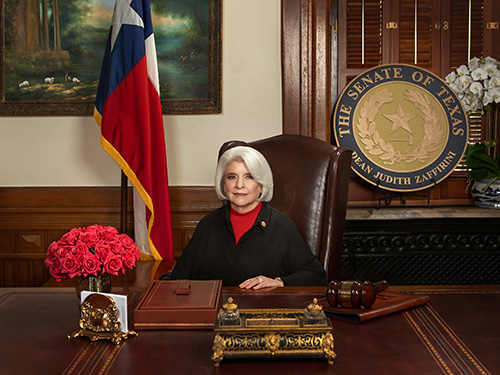 Photo: Dean Senator Judith Zaffirini seated at her desk